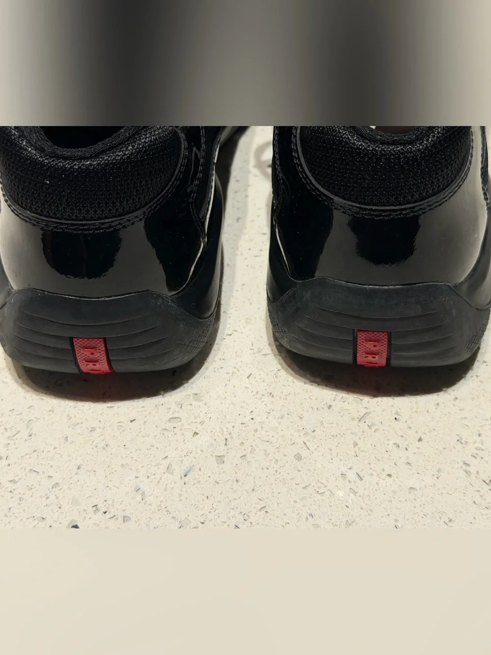 Prada America Cup Black patent leather Athletic Sneakers with Red Accent